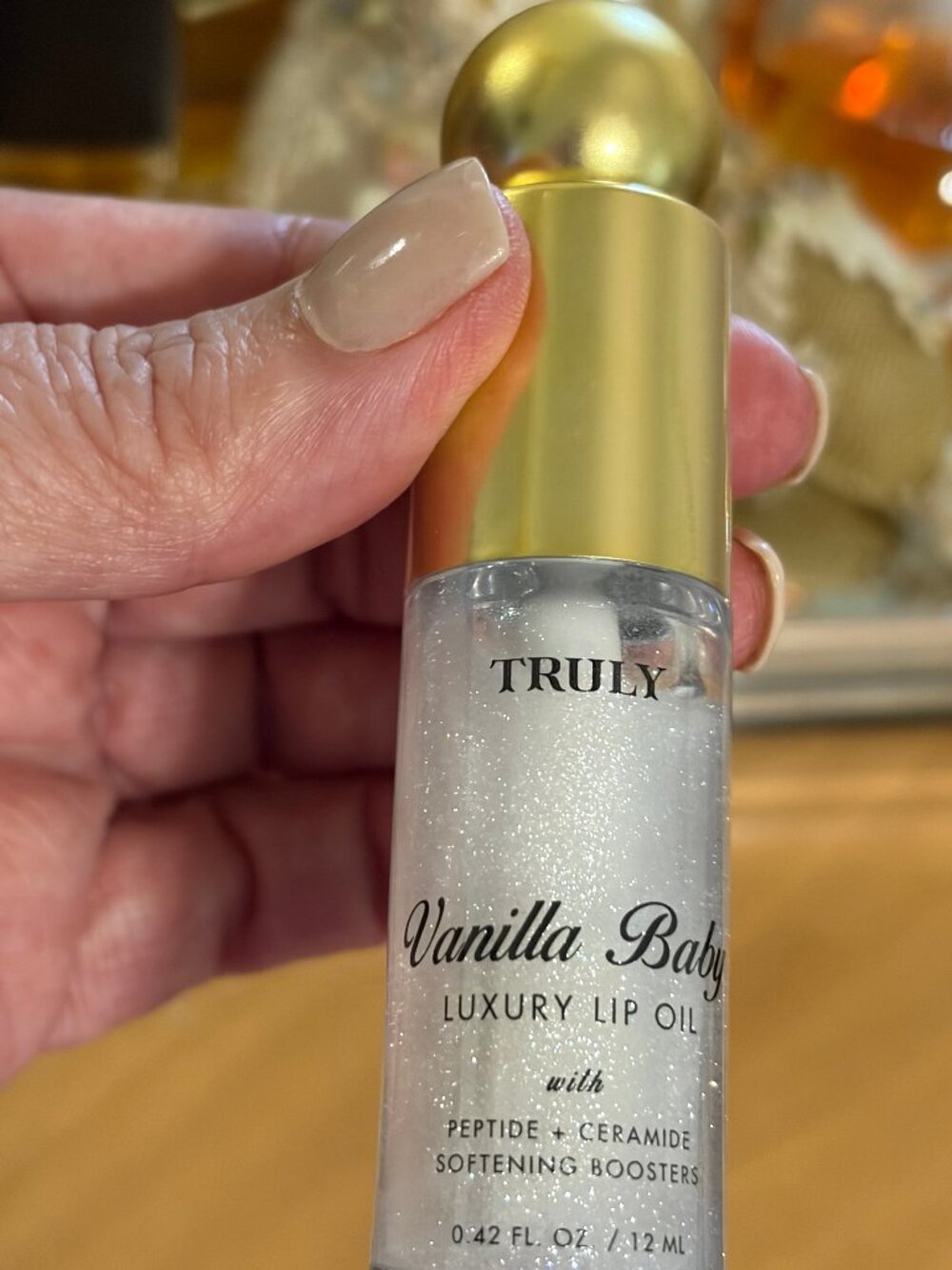 TRULY LUXURY LIP OIL IN VANILLA BABY